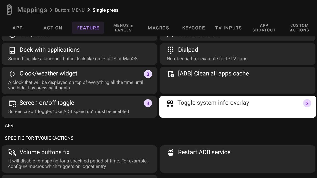 Action picker open on the Feature tab with Toggle system info overlay highlighted